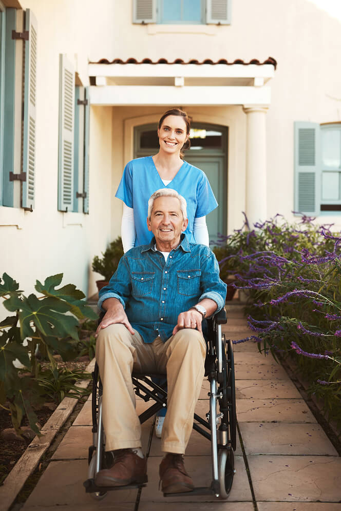 Nurse Comforting Elderly Woman at Nursing Home Colleyville